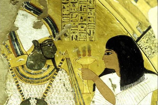 Inherkhau making offerings to Osiris