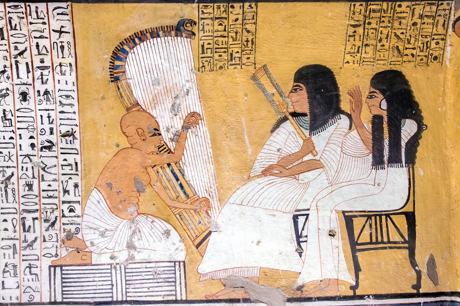 A blind harper playing and singing for the royal necropolis foreman Inherkau and his wife Wabet