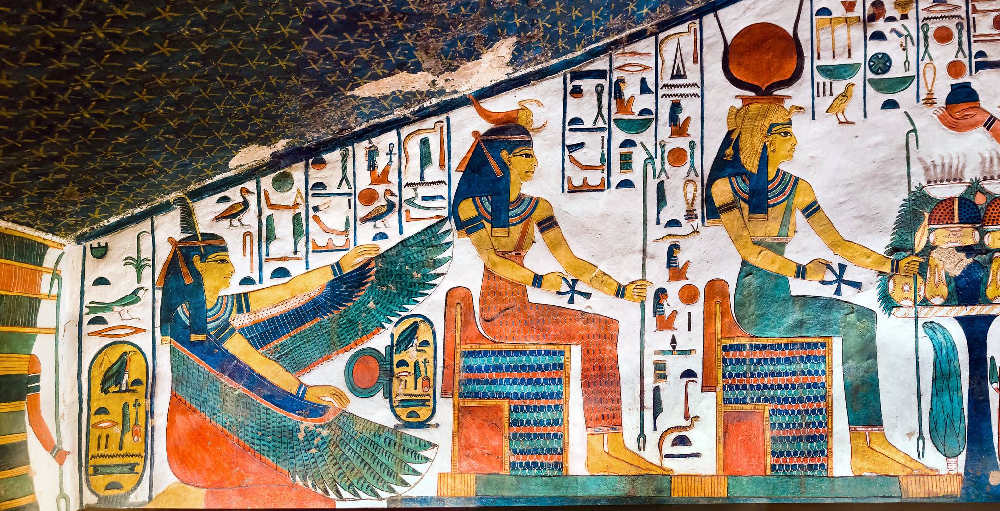 Queen Nefertari facing three female deities in her tomb