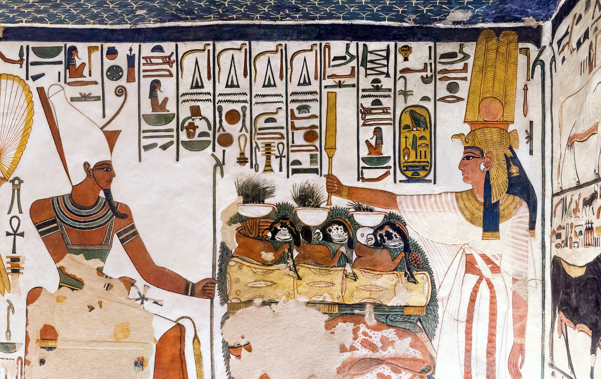 Queen Nefertari standing before the god Atum in her tomb, QV66