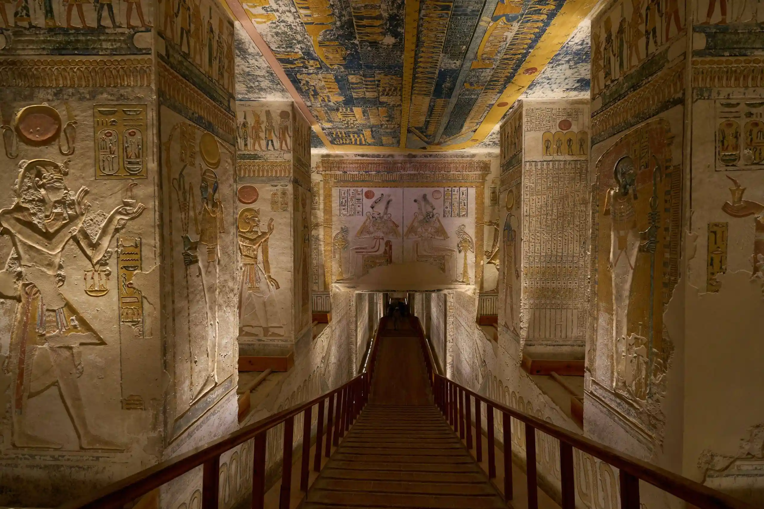 Entrance to a royal tomb carved into limestone cliffs in the Valley of the Kings